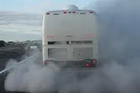 Image of bus emitting smoke