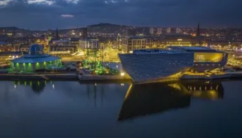 V&A and RRS Discovery at night