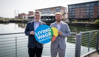 HMS Unicorn on board with the Living Wage Image